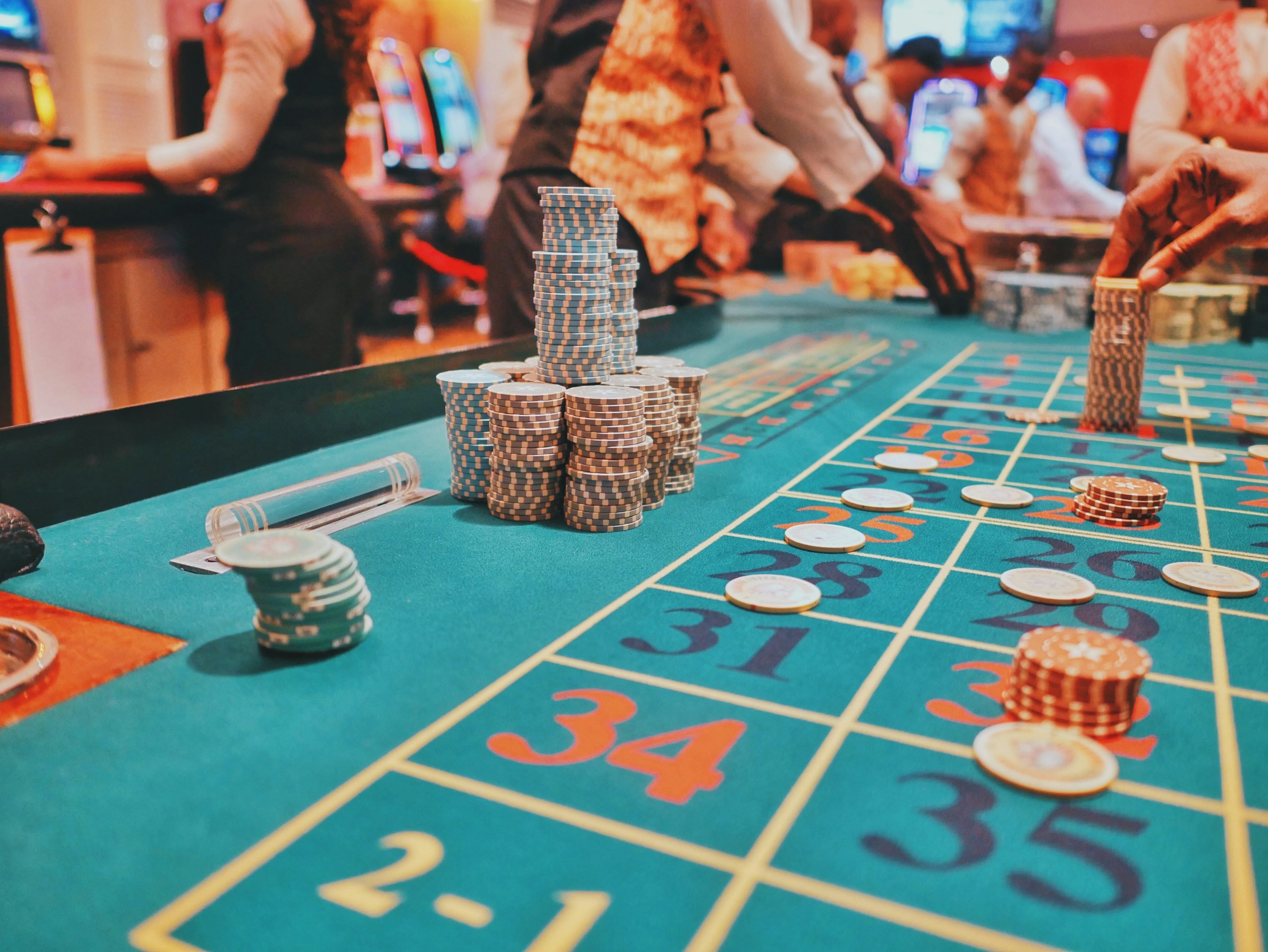 Filipino player on mobile phone accessing Lucky Slots bingo games browser interface